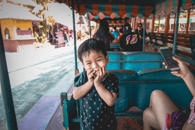 Little boy playing with toy airplane