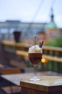 Close-up of drink served on table at outdoor cafe