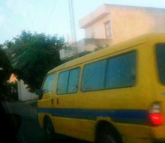 YELLOW CAR ON WINDOW