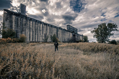 Full length of man on field against sky