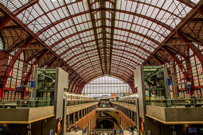 People at railroad station in shopping mall