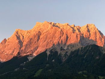 Scenic view of mountain range against clear sky