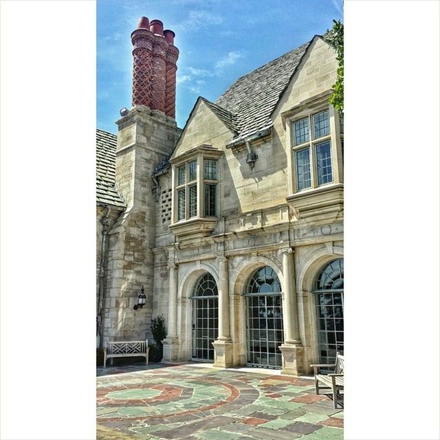 architecture, built structure, building exterior, transfer print, arch, auto post production filter, window, facade, building, day, entrance, sky, city, low angle view, door, exterior, sunlight, church, history, outdoors