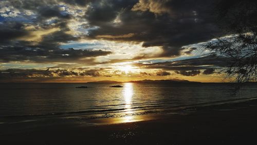 Scenic view of sea against sky at sunset