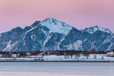 Scenic view of snowcapped mountains against sky during winter