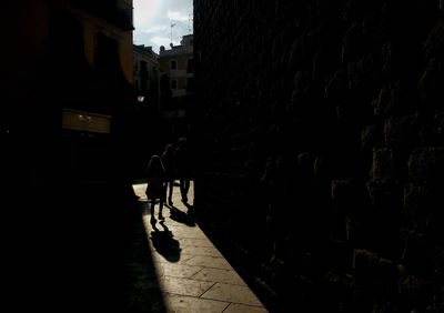 Man in city at night