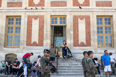 Group of people in front of building