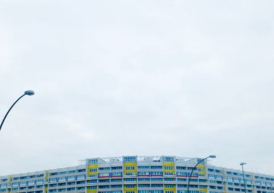 Low angle view of buildings against sky in city