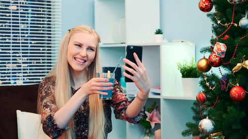 Young woman using mobile phone