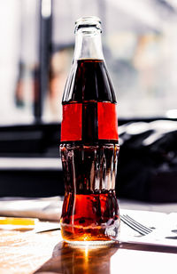 Close-up of beer glass on table