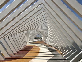 Low angle view of person on staircase in building