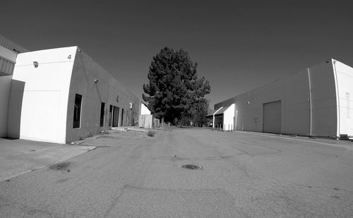 View of road along buildings
