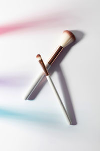 Close-up of chopsticks on white background