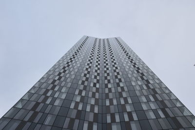 Low angle view of modern building against clear sky