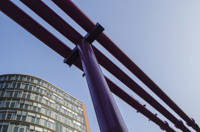 Low angle view of skyscraper against clear sky