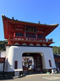 View of temple against clear blue sky