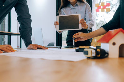 Group of people working on table