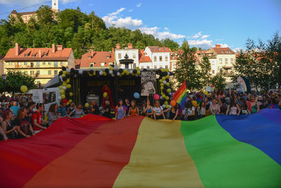 People at town square against sky