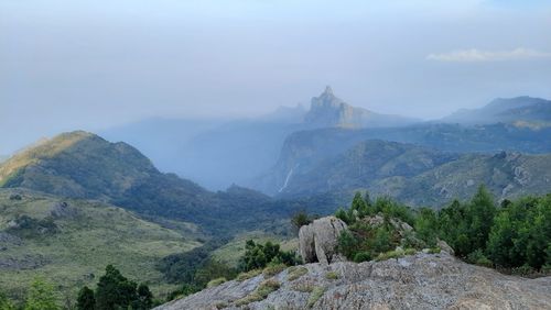 Beautiful scenic view from kodanad view point ooty of misty rain cloud hill mountain green forest