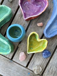 High angle view of multi colored ceramics  on table