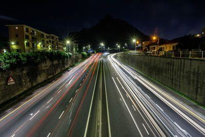 Light trails on road at night