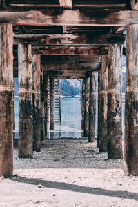 Underneath view of pier at lakeshore