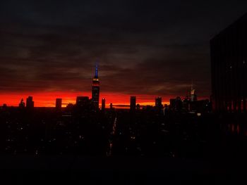 Silhouette of city at night