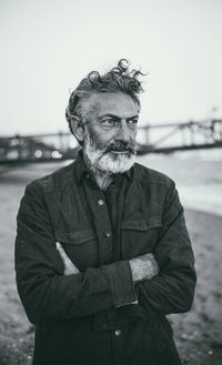Portrait of man standing outdoors
