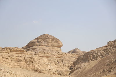 Scenic view of rocky mountains against clear sky