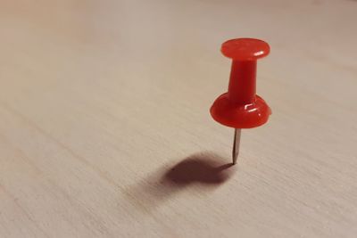 High angle view of red toy on table