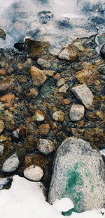 High angle view of stones at beach