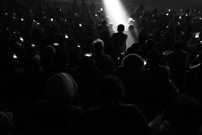 People enjoying music concert