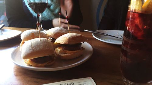 Burgers in plate on restaurant table