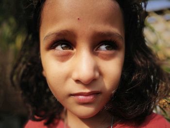 Close-up of girl looking away