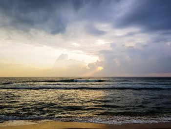 Scenic view of sea against sky during sunset