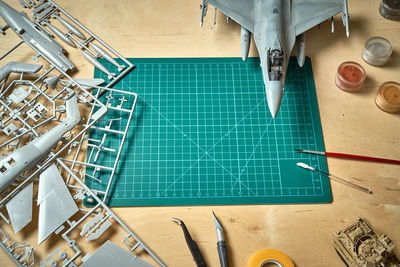 High angle view of toy with paintbrush on table