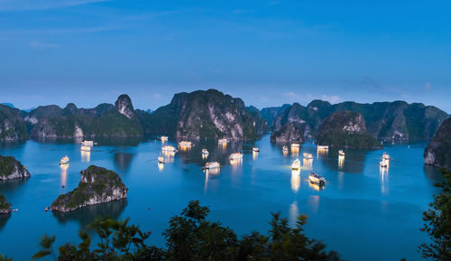 Panoramic view of sea and mountains against sky