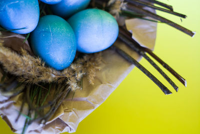 High angle view of multi colored eggs on table