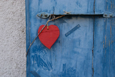 Close-up of heart shape hanging on door