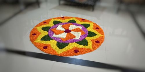 High angle view of multi colored painting on floor