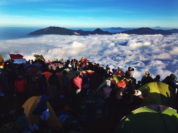 Scenic view of mountains against cloudy sky