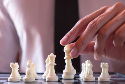 Close-up of human hand against the background