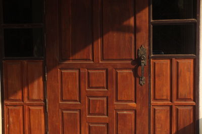 Closed wooden door of house