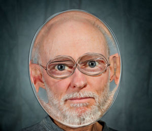 Close-up portrait of man wearing mask