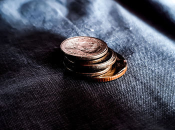 High angle view of coins on table