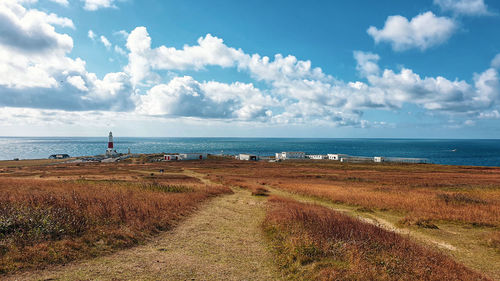 Scenic view of beach against sky