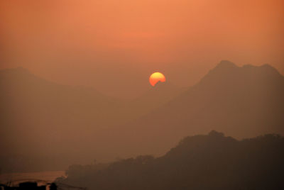 Scenic view of mountains at sunset