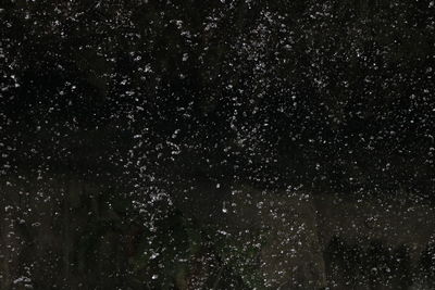 Scenic view of star field against sky at night