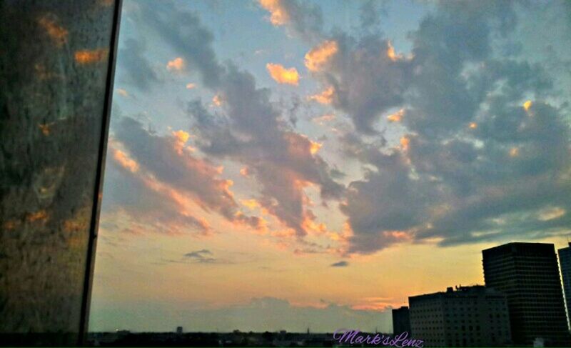 sunset, sky, cloud - sky, architecture, building exterior, orange color, built structure, silhouette, cloud, cloudy, scenics, dramatic sky, beauty in nature, city, nature, low angle view, outdoors, moody sky, no people, tranquility