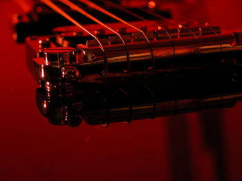 Close-up of red guitar